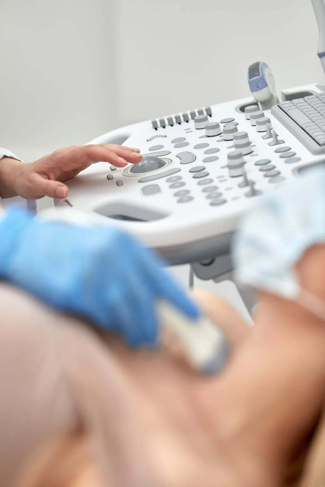A doctor performing an ultrasound examination